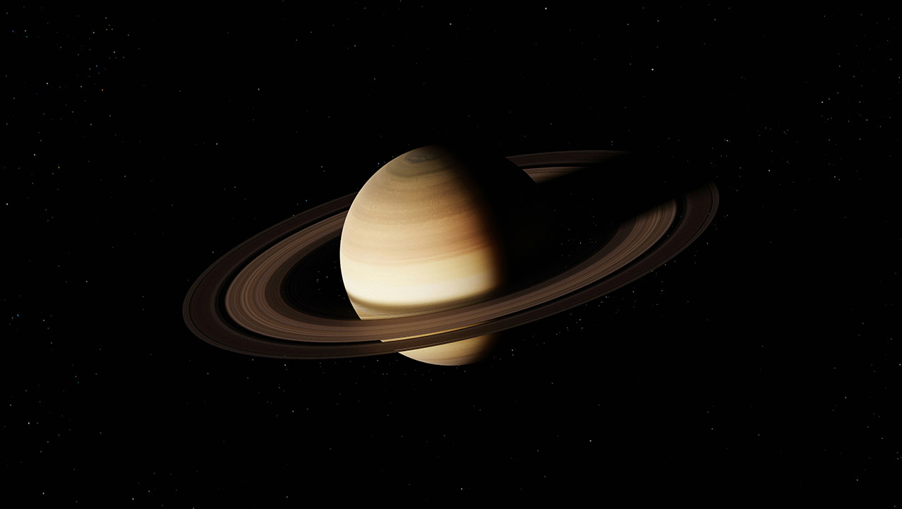 在漆黑深空中帶有清晰環狀結構的恆星,星球表面呈現黃褐色條紋。
